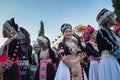 Hmong girls in traditional dress in the parade for promoted 46th Thailand National Games.